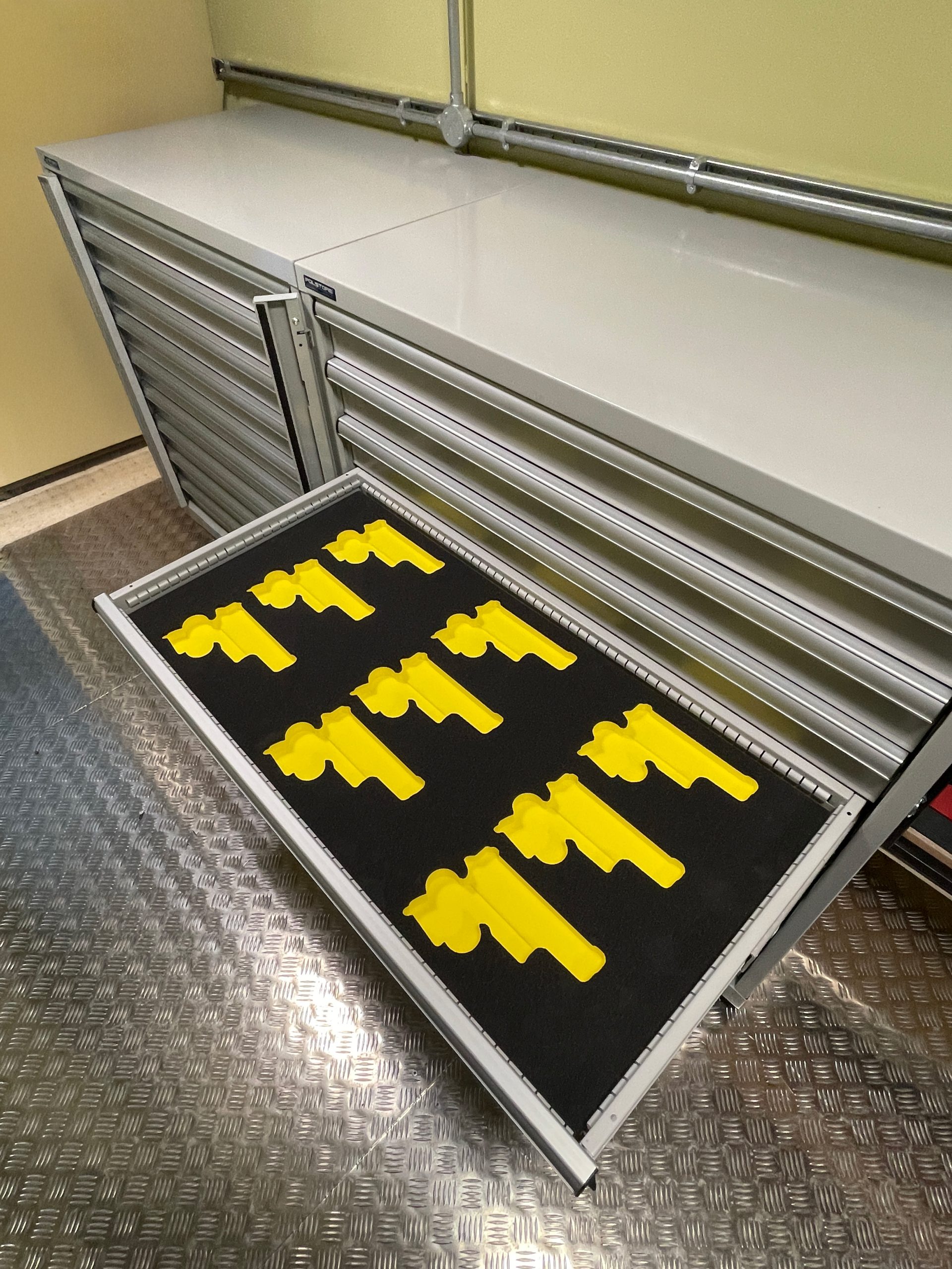 Steel pistol cabinets and weapon racks